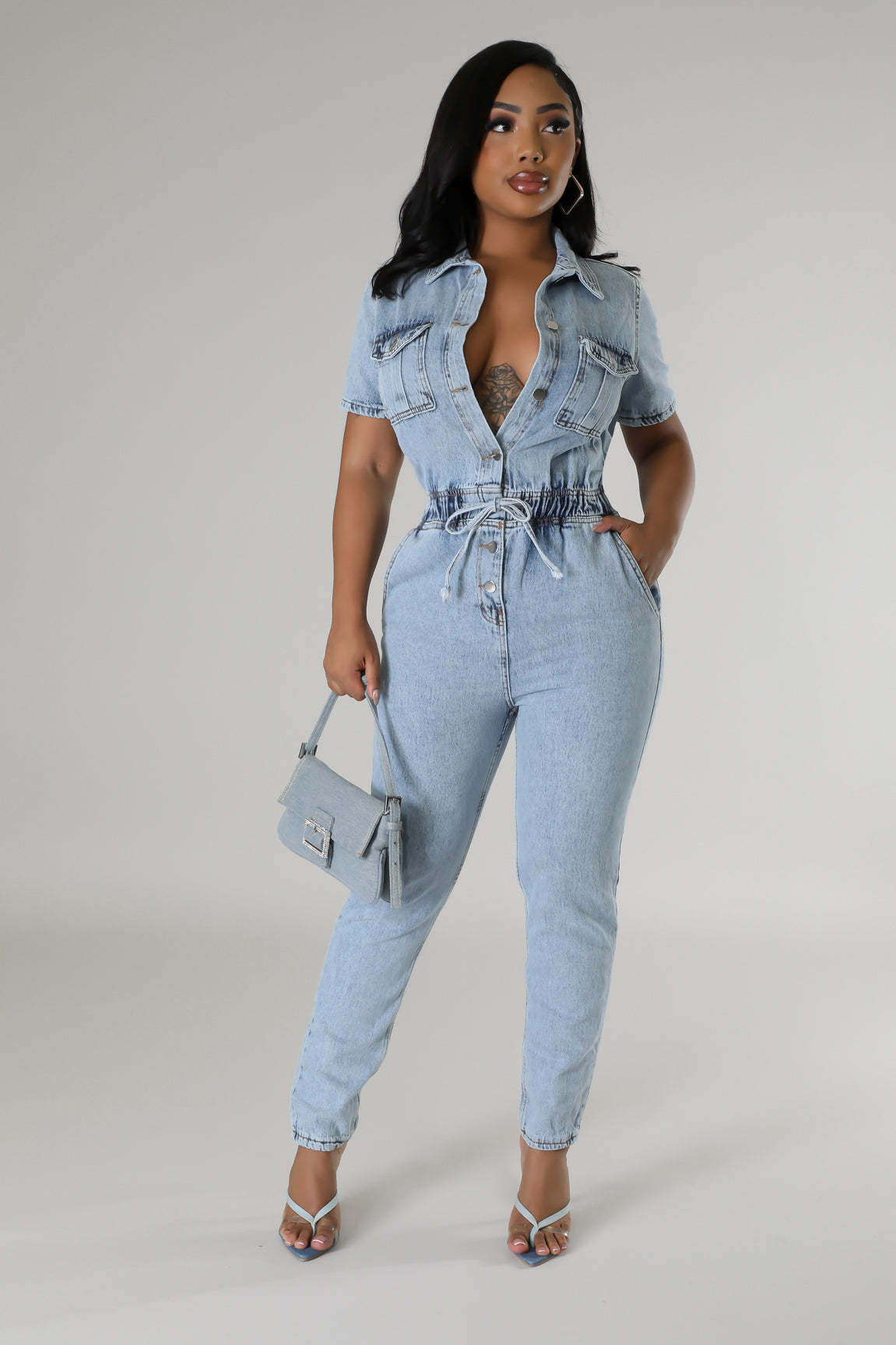 Chic Denim Jumpsuit with Tie Waist and Collared Neckline